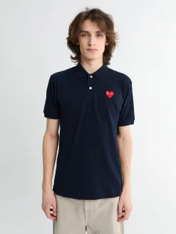 Polo med rødt emblem i navy